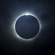 A total solar eclipse is seen from the beach on Ternate Island, Indonesia, March 9, 2016.